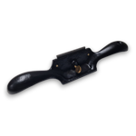 Close-up of the Pegasus Pro No. 80 cabinet scraper showing its cast iron body and the adjustable scraper blade.