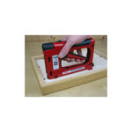 Inserting flexible metal tabs into a wooden picture frame using the T225 tab driver