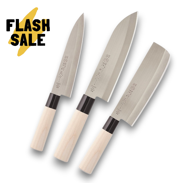 Three-piece Tsubazo knife set including Gyuto, Nakiri, and Santoku styles.