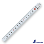 Shinwa 13131 ruler being picked up using the bent tapered end feature.