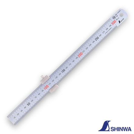 Shinwa 76752 ruler with stopper being used to measure the depth of a hole.