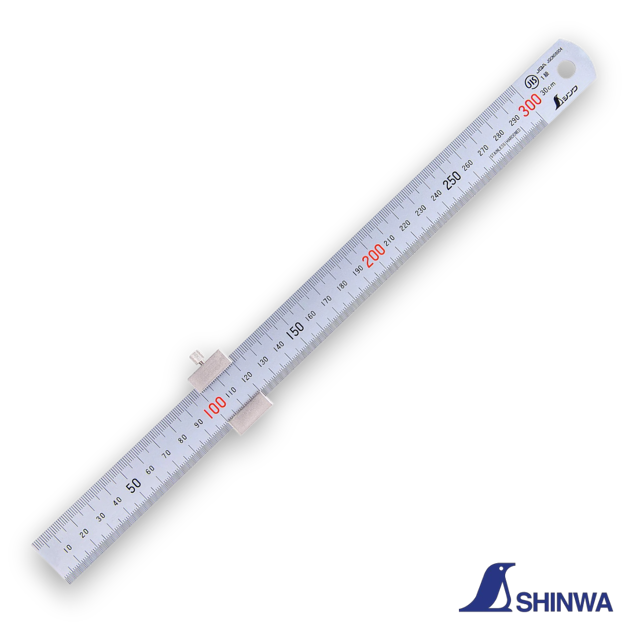 Shinwa 76752 ruler with stopper being used to measure the depth of a hole.