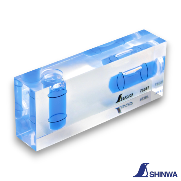 Shinwa 76387 Revo Clear Cube showing two-direction bubble vials on a transparent acrylic body