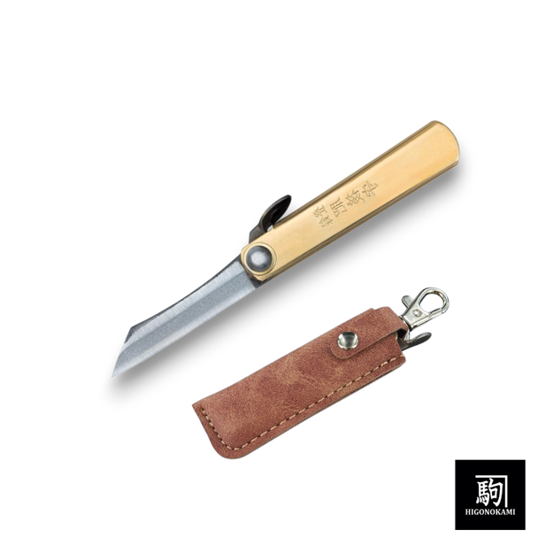 Mini SK5 Higonokami Japanese folding knife with a gold-tone brass handle and sharp carbon steel blade, shown with its black leatherette protective case