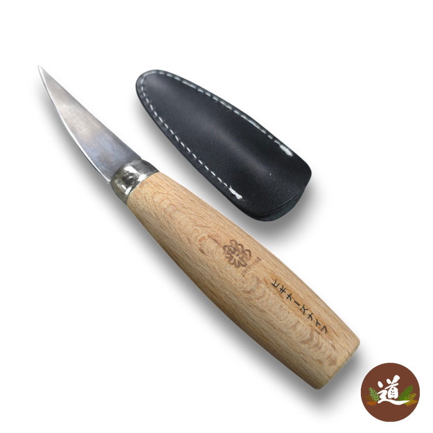 Michi Hamono MT-500 small whittling knife with a short pointed steel blade and natural wood handle.