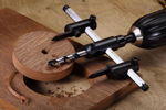 Star-M adjustable circle hole cutter creating precise circular cuts in wood and plywood for woodworking and installation projects.