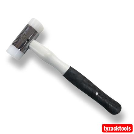 38mm dual-faced nylon hammer with white replaceable soft nylon heads, polished steel head, and black textured grip handle, ideal for non-marking engineering, woodworking, and assembly work.