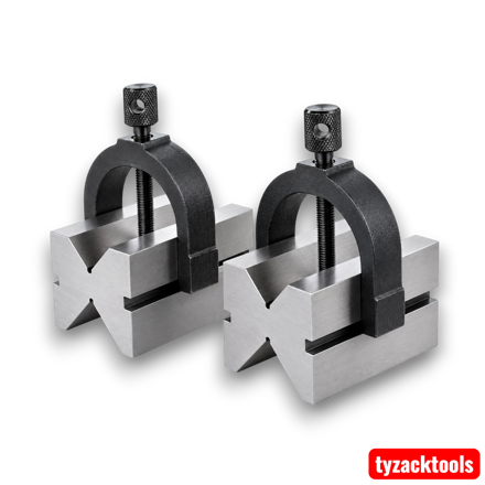 Vee Blocks and steel clamps, precision ground and hardened for engineering work.